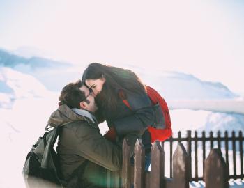 A couple enjoying a special moment during a ski trip